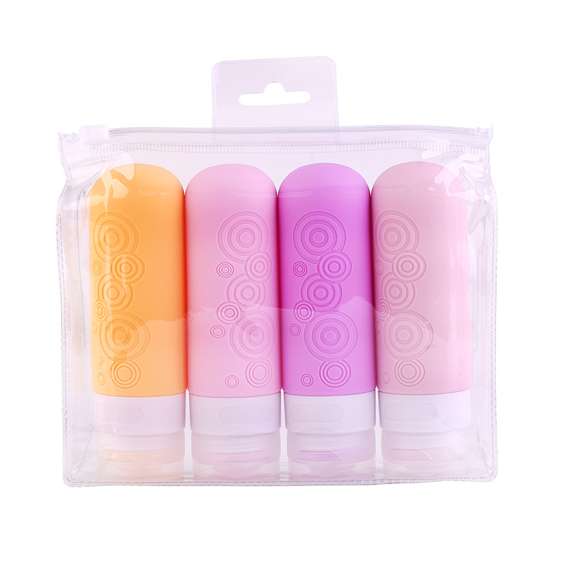 Refillable silicone travel bottle with embossed geometric pattern and leak-proof cap for toiletries and skincare liquids.