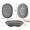 Double-layer silicone soap dish with drainage holes and a detachable base for mess-free bathroom and kitchen sink storage.