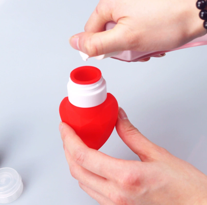 Bulb-shaped colorful silicone travel bottles for toiletries and lotions with a leak-proof squeeze design for easy packing.