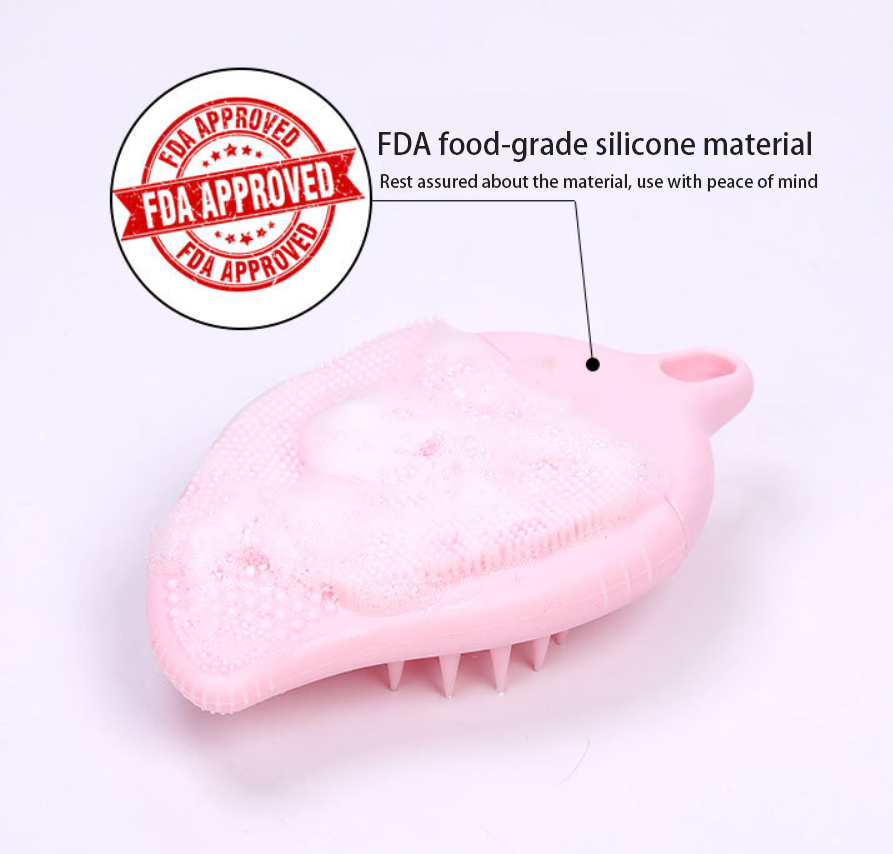 Leaf-shaped FDA food-grade silicone cleaning brush with soft bristles for gentle facial exfoliation and body massage.