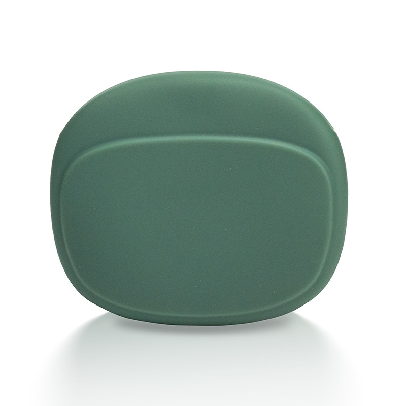 Minimalist matte silicone earphone cases in dusty rose, sage green, and beige, displayed on a clean aesthetic desk setup for tech organization.